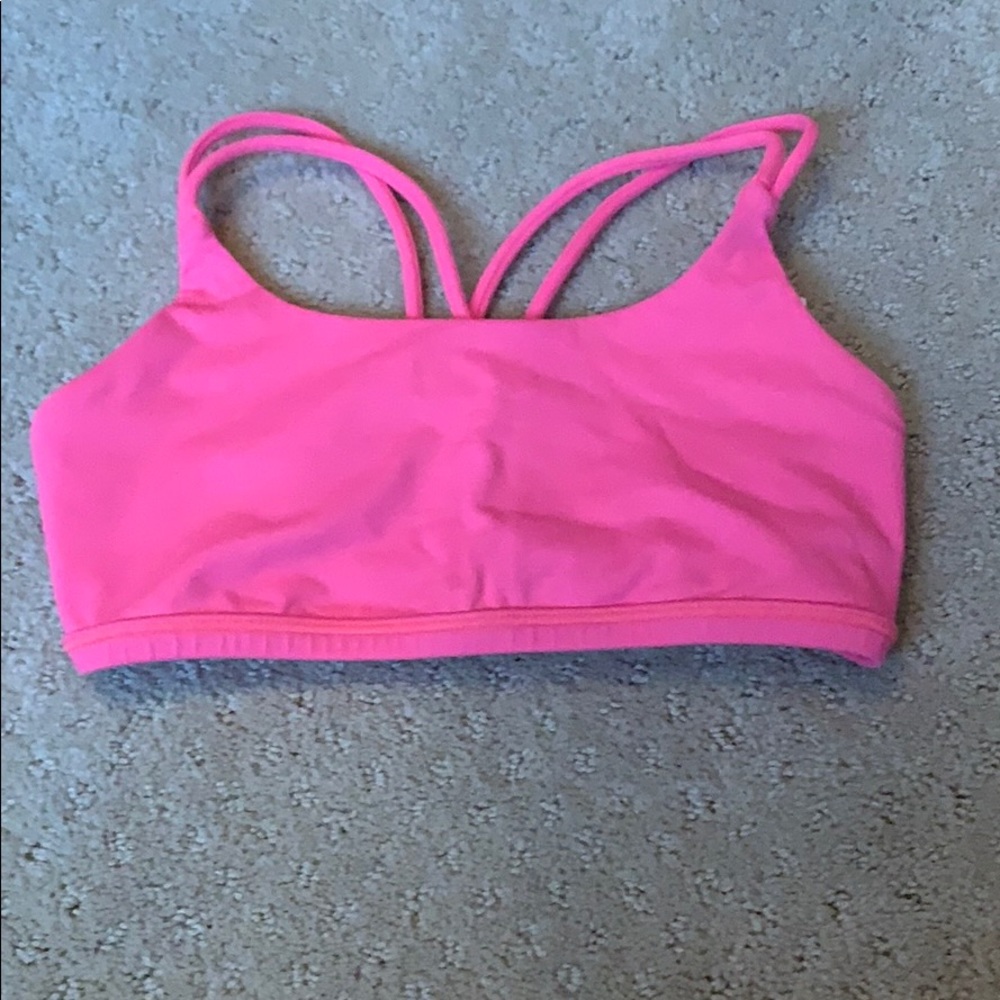 this is a bright pink ivivva crop top